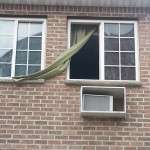 green curtain red brick